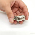 Retro-style metal pig measuring