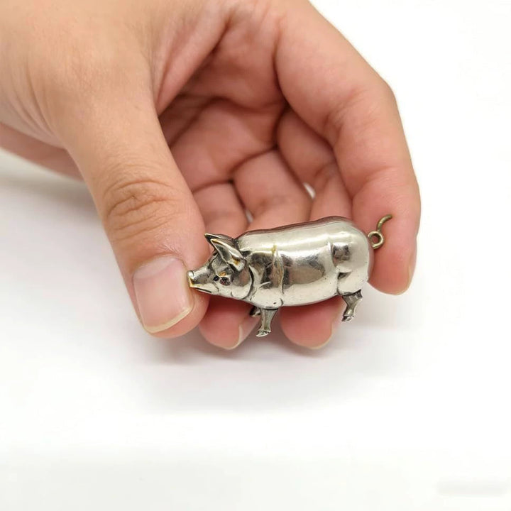 Retro-style metal pig measuring