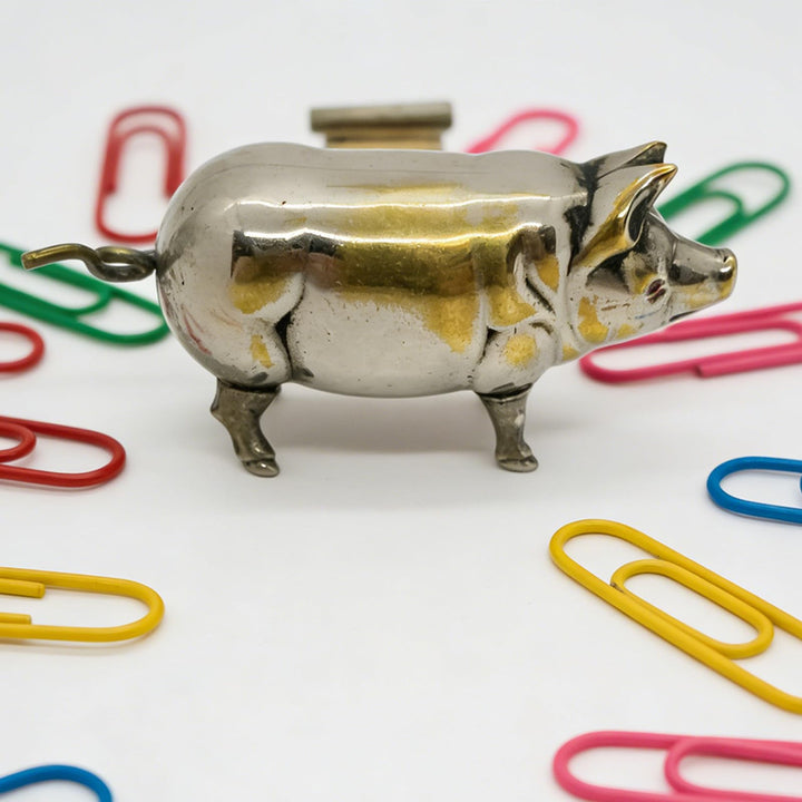 Retro-style metal pig measuring