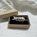 Retro-style metal pig measuring