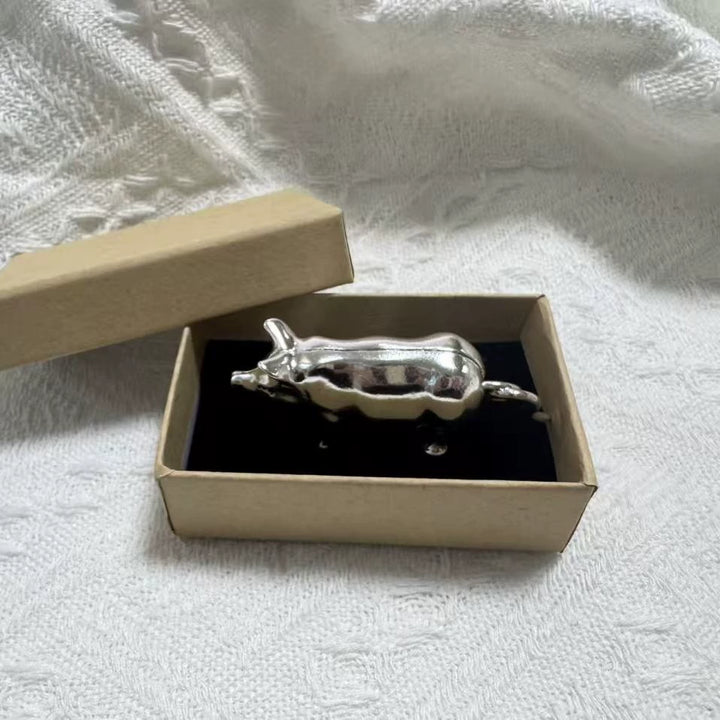 Retro-style metal pig measuring