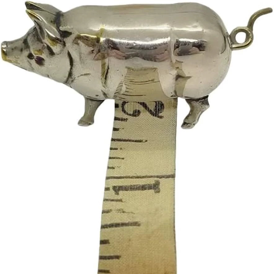 Retro-style metal pig measuring