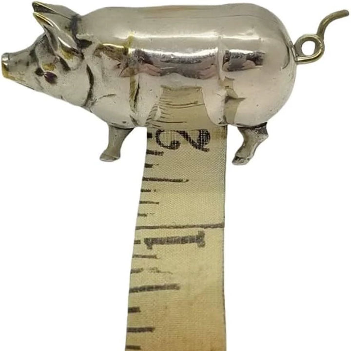 Retro-style metal pig measuring