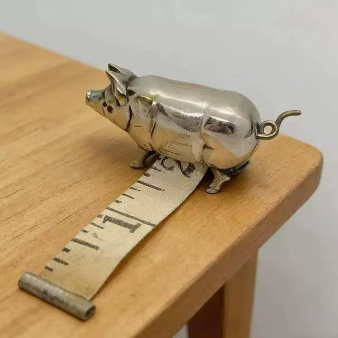 Retro-style metal pig measuring